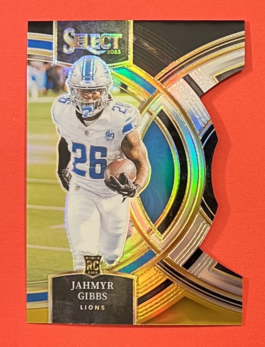 2023 Select - Premier Level Jahmyr Gibbs #198 Black & Gold Prizm Die-Cut (RC)