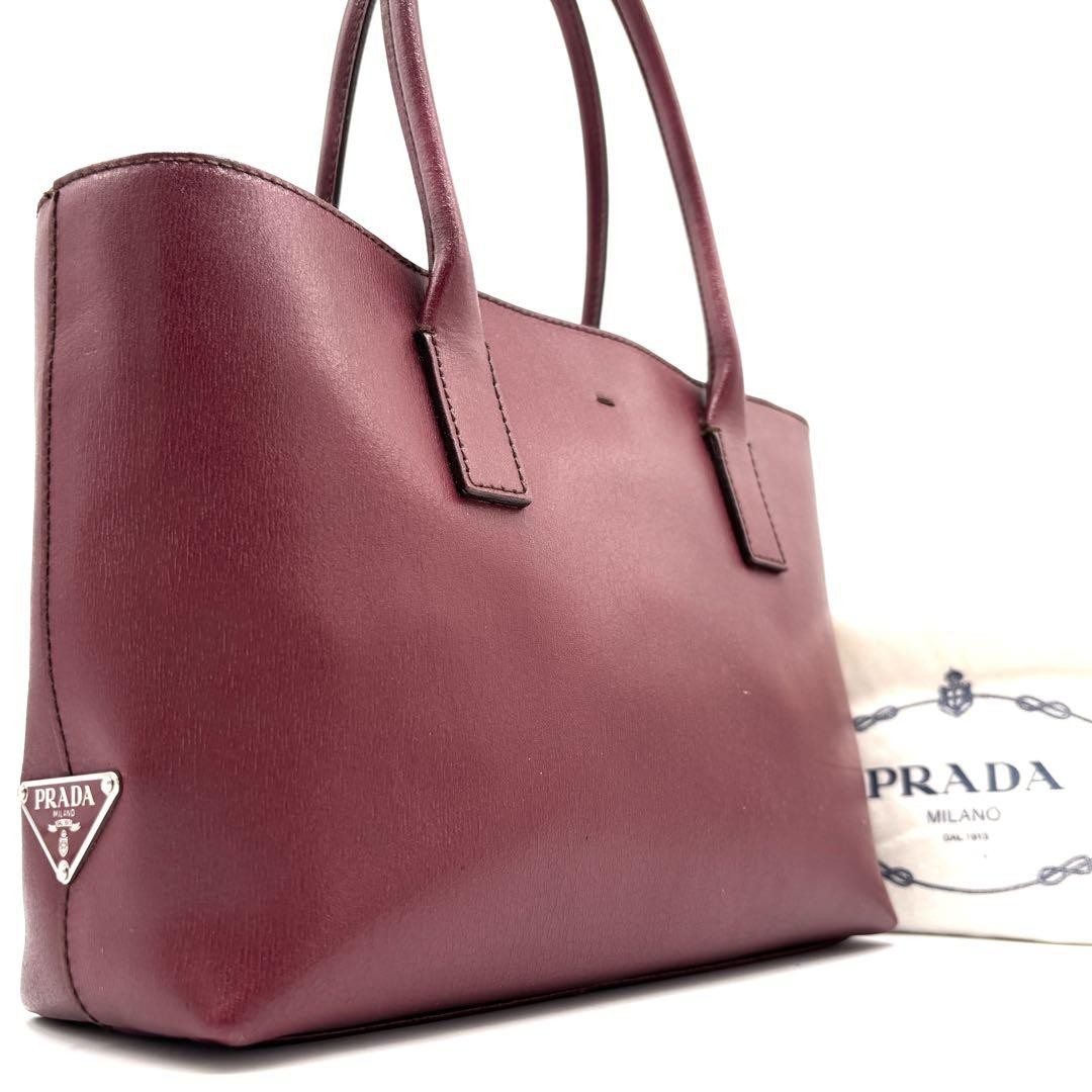 Prada white leather handbag with triangular logo in excellent condition