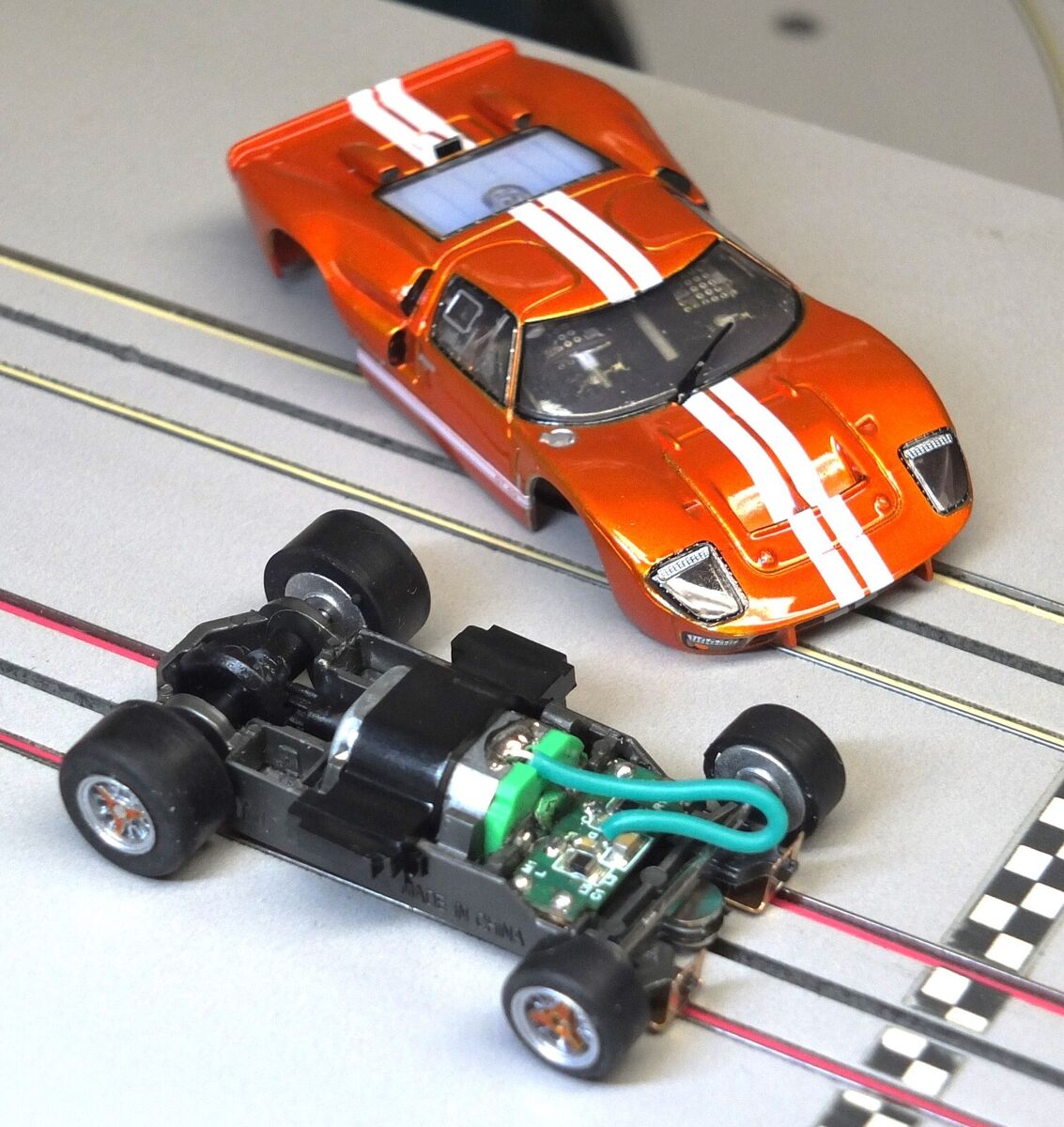 AFX 22109 - Ford GT40 Mark II Mega G+ HO Slot Car - Orange AFX 22109 - Ford GT40 Mark II Mega G+ HO Slot Car - Orange
