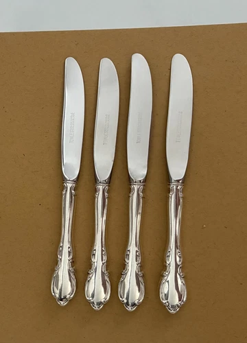 Set of 4 Towle Sterling Silver Legato Butter Spreaders.