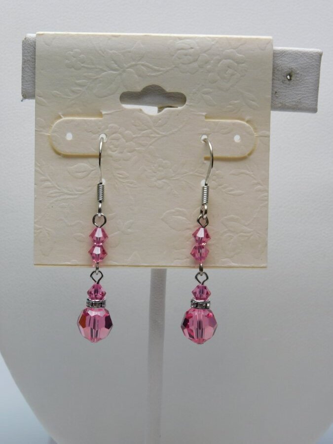 J839-VINTAGE PIERCED EARRINGS~NEW OLD STOCK~PINK CRYSTALS~1.5