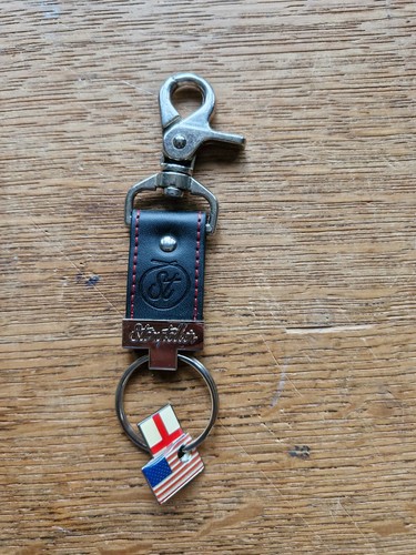 STORYTELLER FLAGMATE KEYCHAIN / KEYRING BNWOT RED OR BLACK FAUX LEATHER