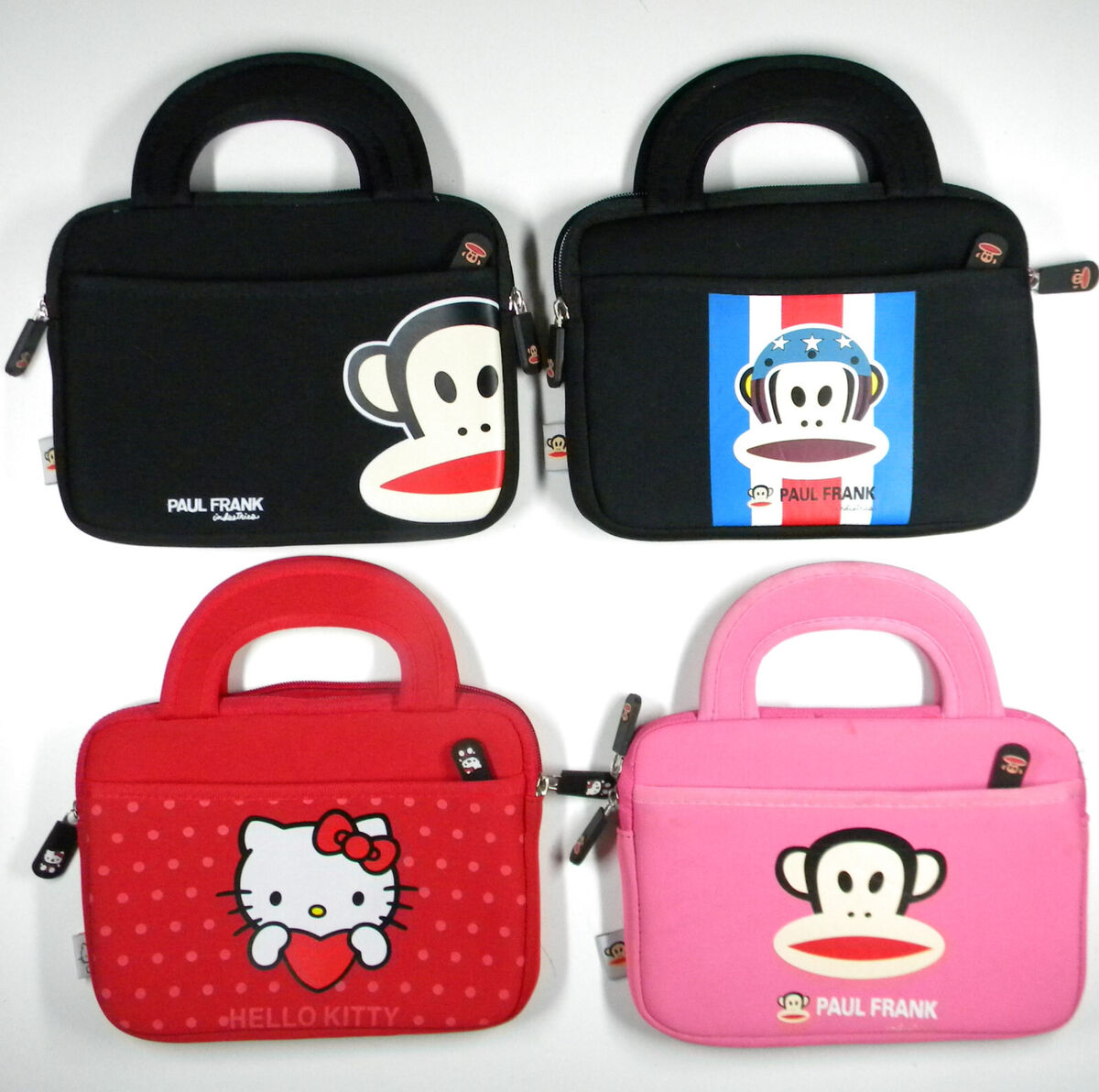 4 padded cases. 3 Paul Frank, Julius Monkey, 1 Hello Kitty.(9 4 padded cases. 3 Paul Frank, Julius Monkey, 1 Hello Kitty.(9