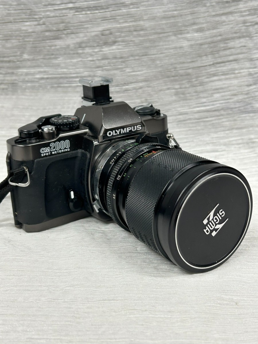 Olympus OM2000 Spot Metering SLR Film Camera 62MM Skylight