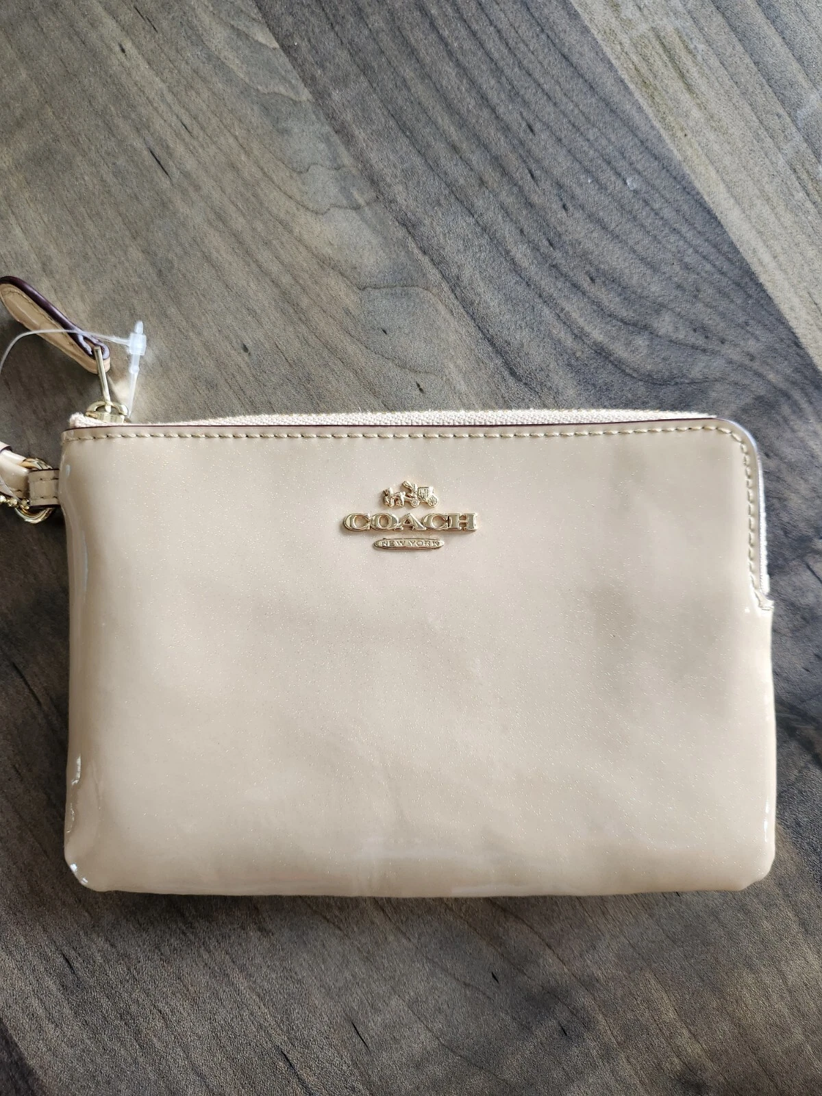 Polso con cerniera Coach Corner crema oro