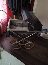 Vintage Black Silver Baby Carriage with Metal Frame Canopy and Fabric Details