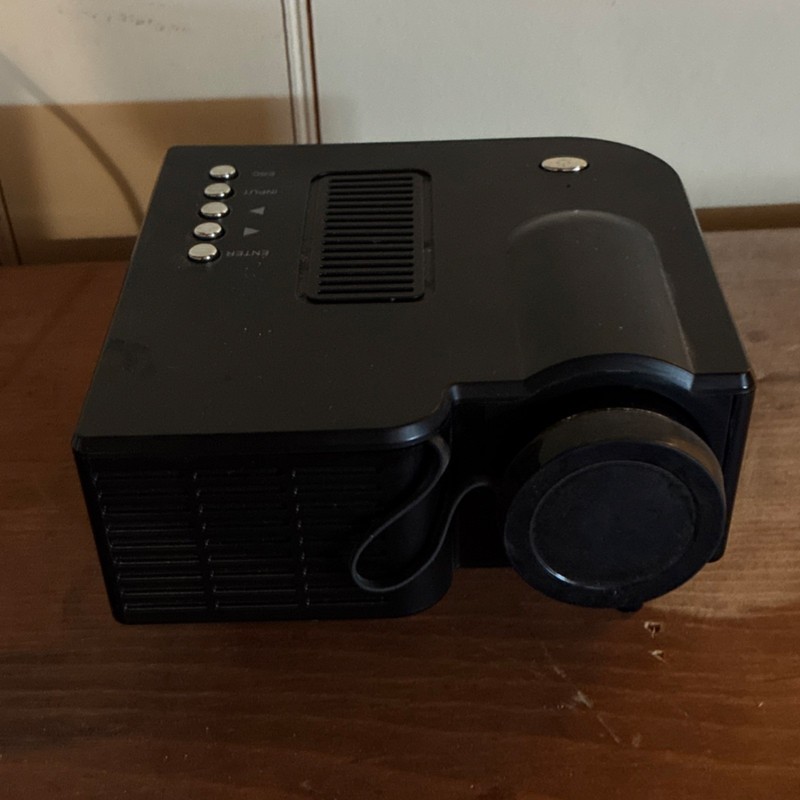 Black LCD LED Desktop Projector with VGA, IR, HDMI Ports 12VDC 2A RoHS Certified