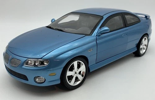 Pontiac GTO 2004 CAR and DRIVER Selection im Maßstab 1:18 Auto World OVP NEU - Bild 3 von 4