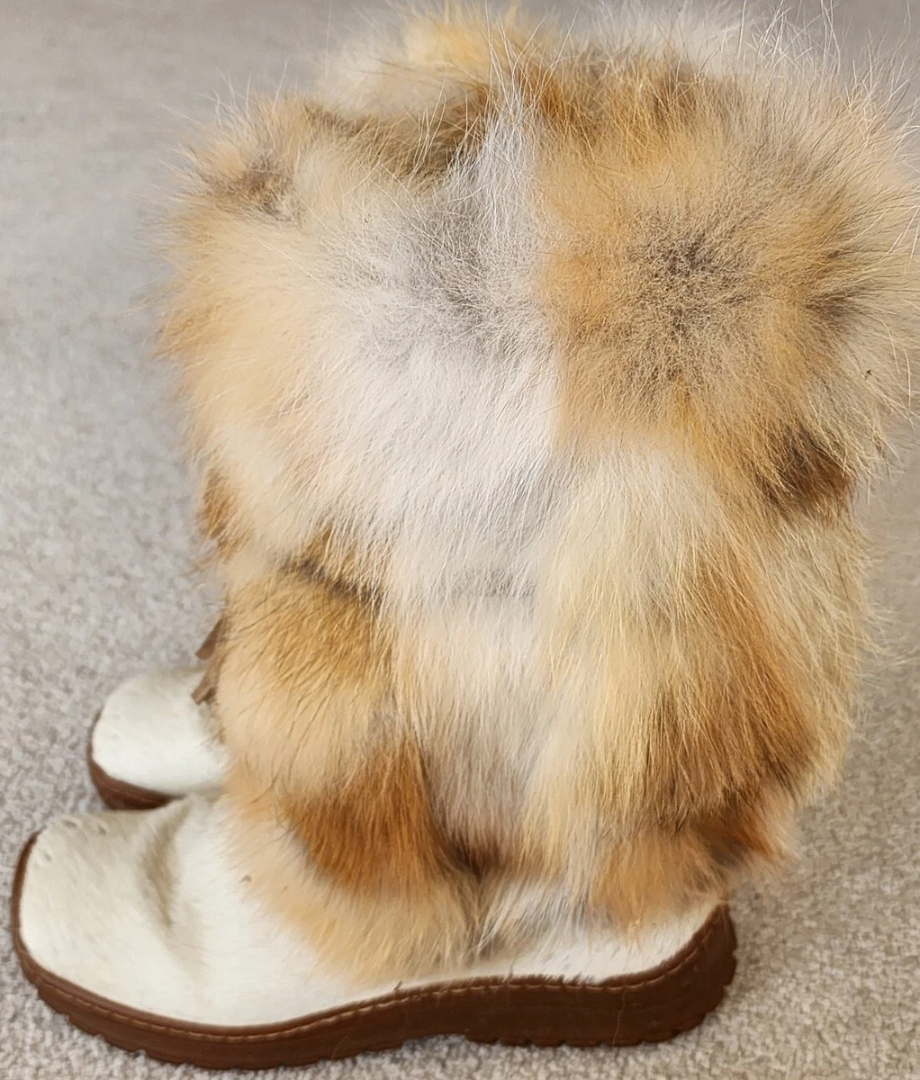 Boots with fur store on them