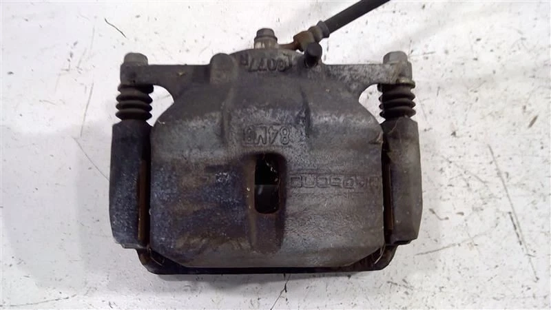 Pinza de freno de disco delantera izquierda Nissan Rogue Sport 2017-2022 OEM 41011-4BA0C Foto 2 de 4