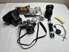 Olympus OM-1 with Olympus Zuiko 50mm f/1.4 lens and extras