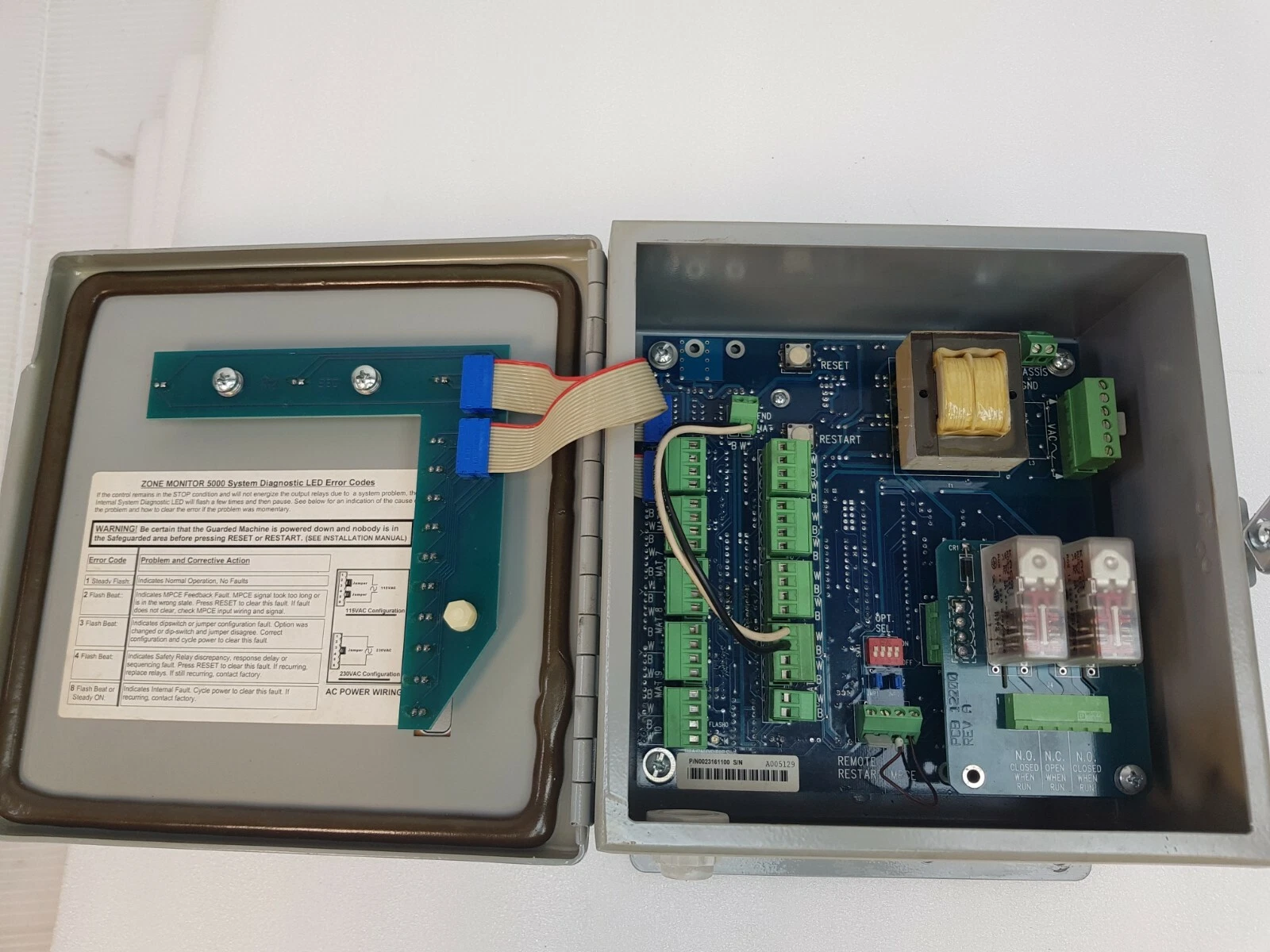 Zone Monitor 5000EX with the door open, showing the control board, relays and transformer