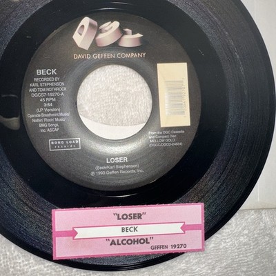 Beck Used 45rpm Record  Loser  And  alcohol  GOOD Cons. White Paper Sleeve W/tag