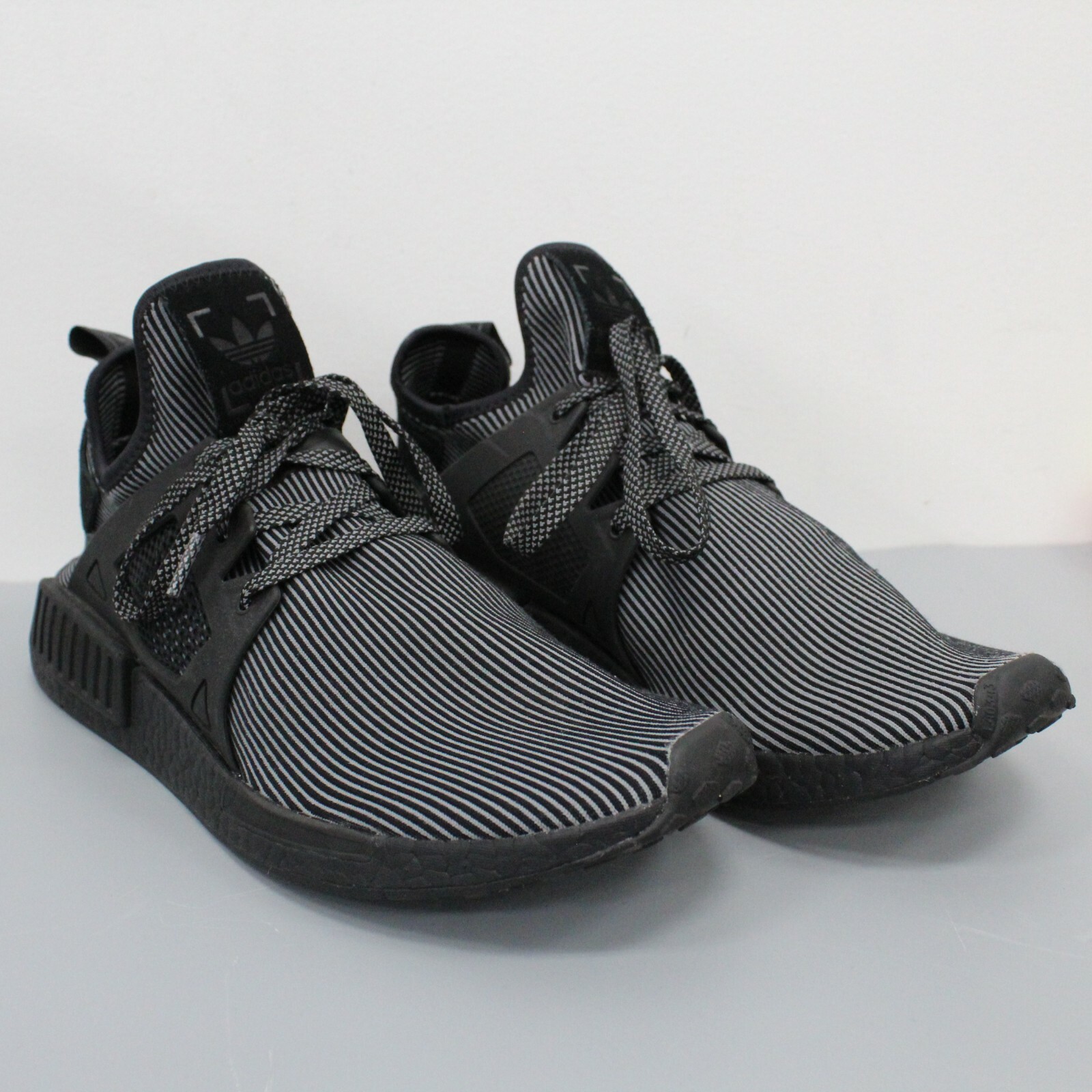 nmd triple black xr1