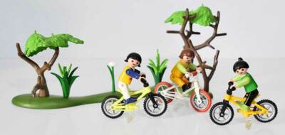 Girls with bikes in the park