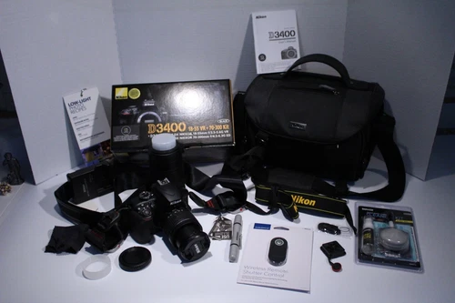 Mint Nikon D3400 with Kit Lens AF-P DX 18-55 mm, 70-300mm, Battery and Charger.