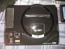 Vintage Sega Mega Drive 16 bit (model 1600-05) with 3 game & controller