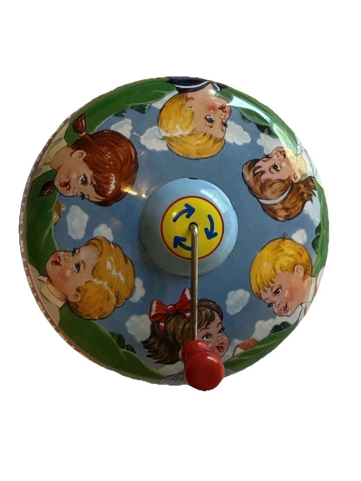 Tapa musical de hojalata Schylling juguete giratorio vintage manivela de metal coleccionable para niños Foto 3 de 4