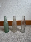 Vintage Coca Cola Bottles one 1944 WW2 D-105529 Patent In great condition + 2
