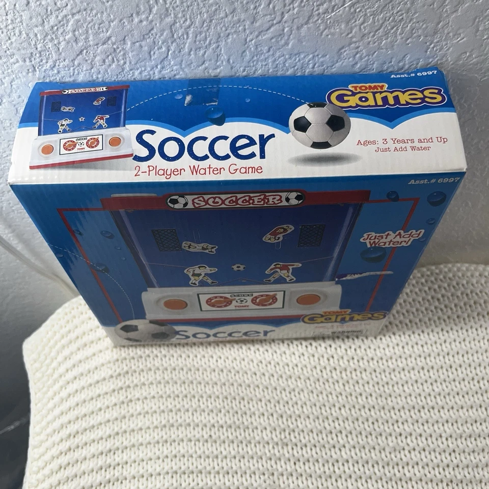 Juego portátil de baloncesto TOMY 1999 vintage para 2 jugadores agua nuevo stock antiguo. Foto 2 de 4