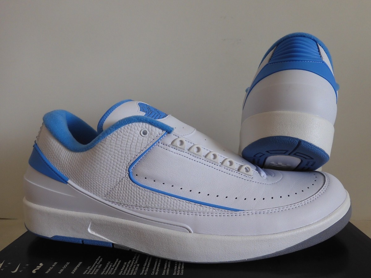 white jordans with light blue bottom