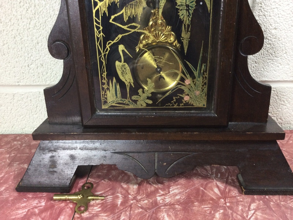 New haven clock Co. 8 day time & strike clock oak case with New haven clock Co. 8 day time & strike clock oak case with