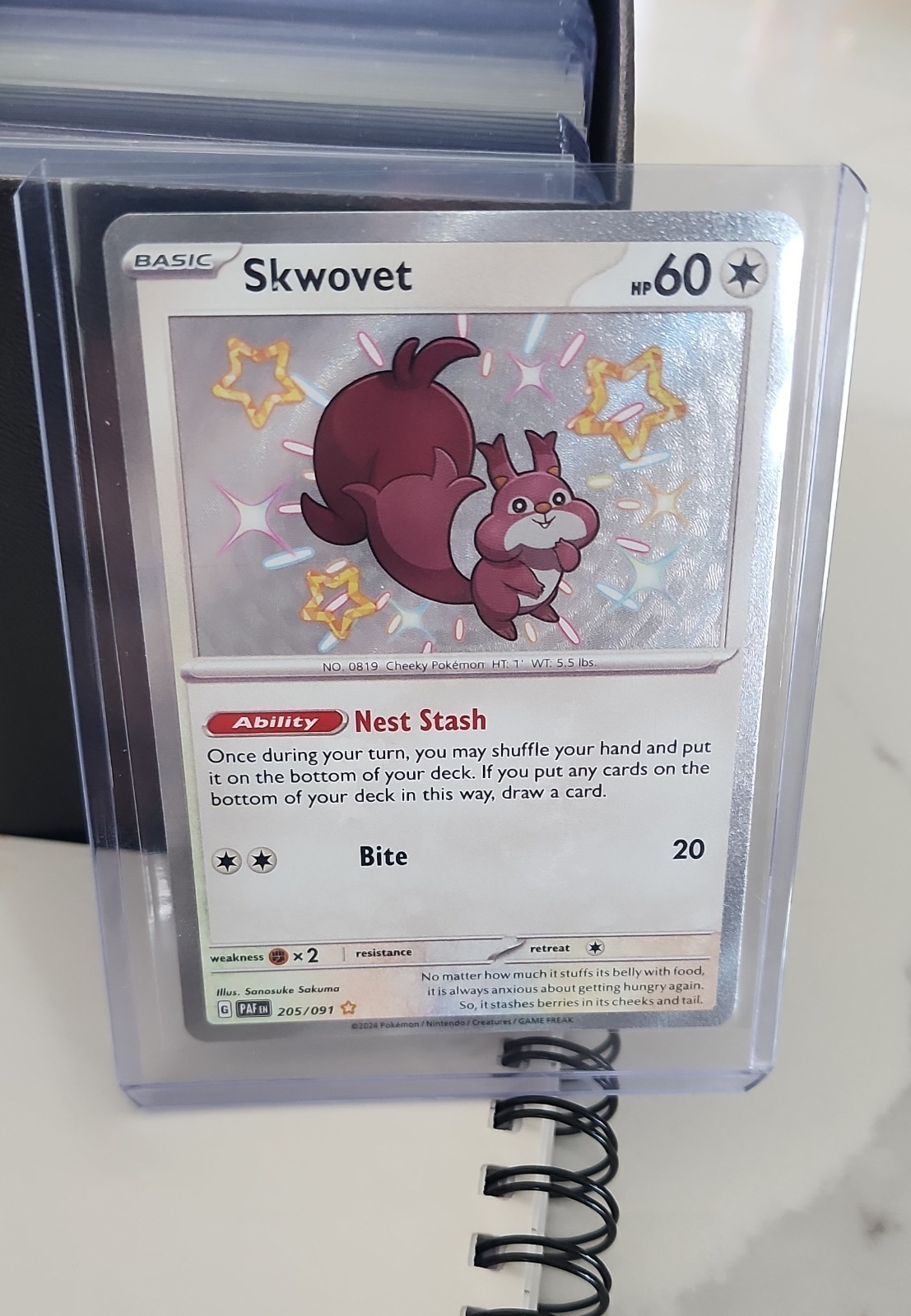 Skwovet 205/091 SV: Paldean Fates Holo