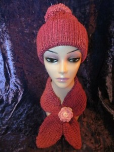pink bobble hat and scarf