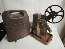 1940 AMPRO Futurist 8mm Film Projector w/Case, and reel, Lights Up