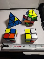 Lot of 4 Rubik's Cubes w/ Magic Star transforming geometric fidget