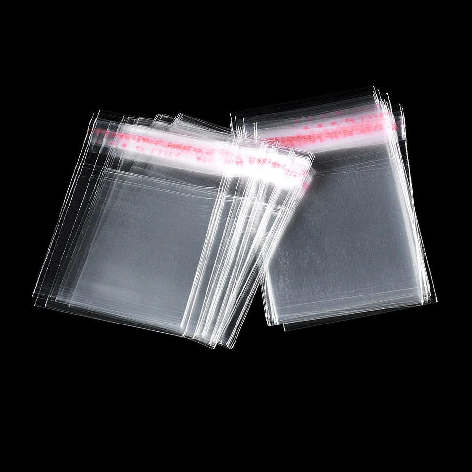 Bolsas de celofán OPP transparentes 1000 piezas bolsas de regalo envoltura joyería embalaje 70x50 mm Foto 3 de 4