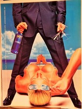 VODKA SKYY CON UNA DAMA SEXY DE COLECCIÓN 2000 AD,