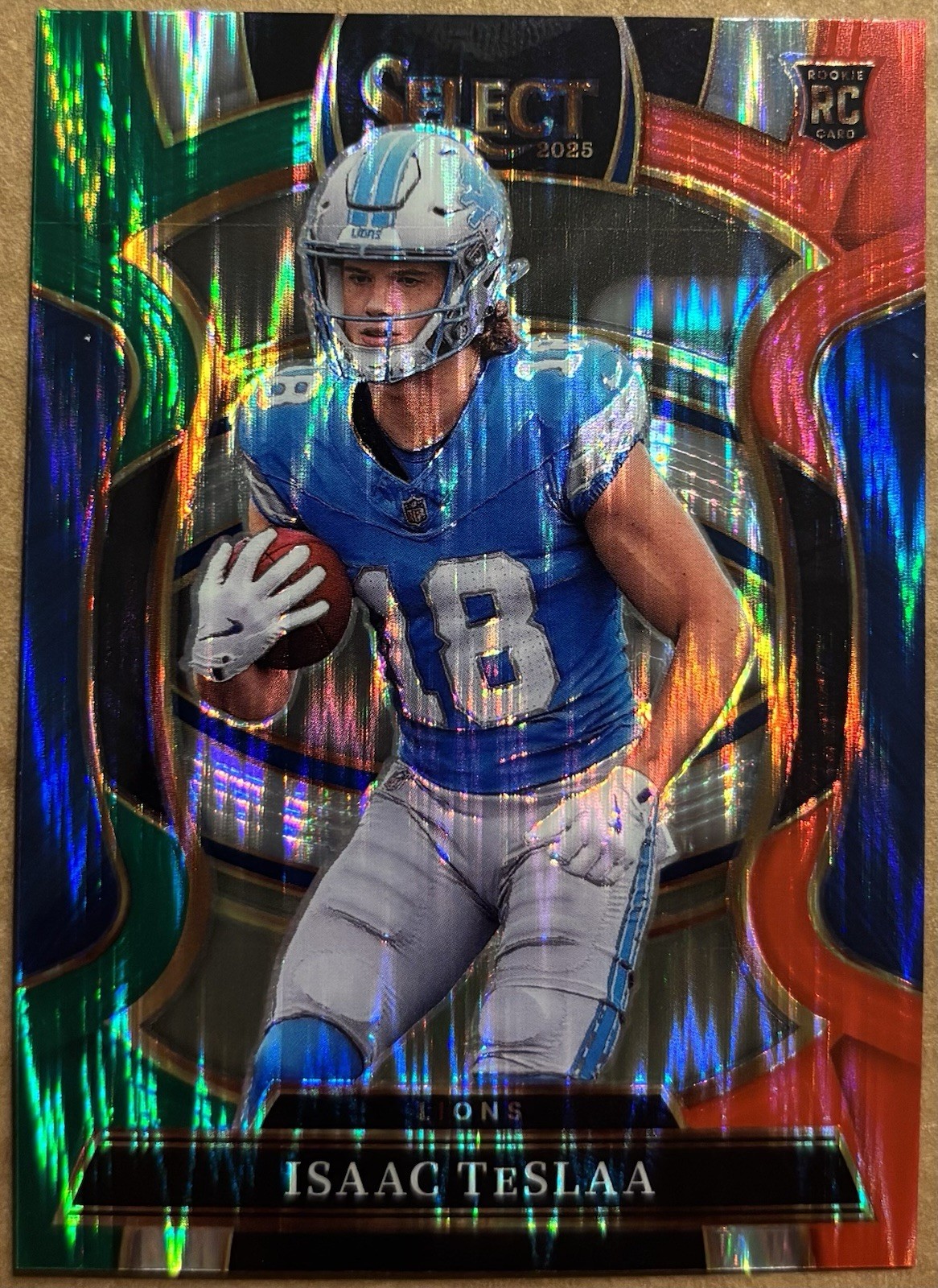2025 Panini Select Green & Red Prizm Shock ISAAC TESLAA #70 (RC) DETROIT LIONS