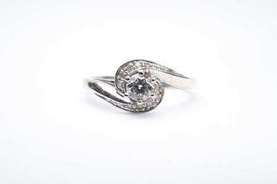 A diamond ring in 18 carat white gold, size US 8.25. Setting measures 8.5m acros