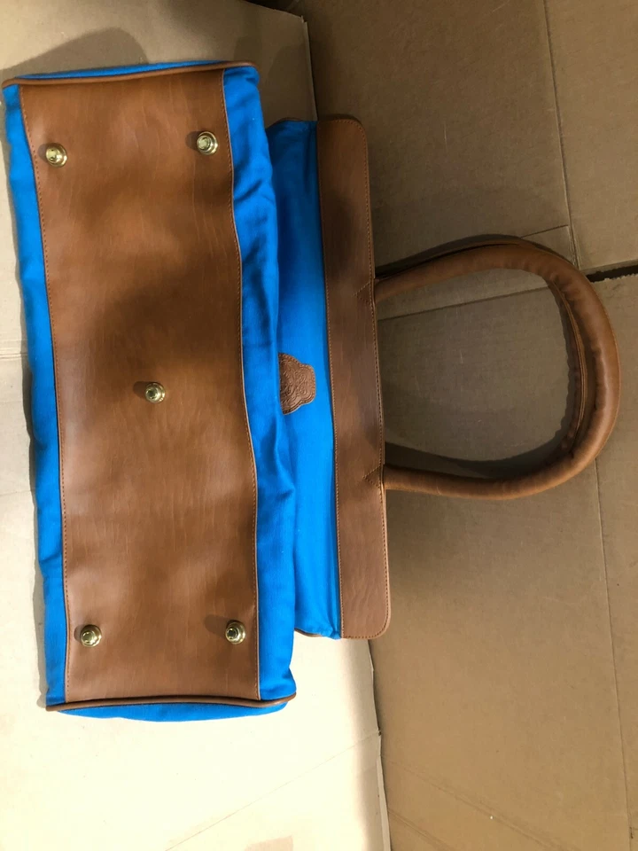 BOLSO DE MANO AVON AZUL LONA CON CREMALLERA CON CUERO MARRÓN*20" LARGO Y 14" ALTO NUEVO Foto 2 de 4