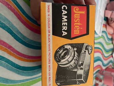 Justen cameras. Takes 120 film. Never used, still in box. I don t know the model