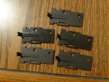 Winchester model 1200 12ga. slide arm bridge.New old stock.