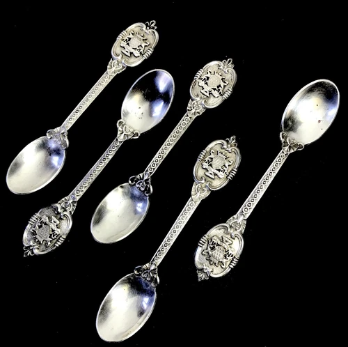 5 SMALL SILVER METAL TEASPOONS WITH ARMS OF BRITTANY