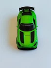 A beautiful, fast, green Mercedes-Benz racing car that would make a good gift.