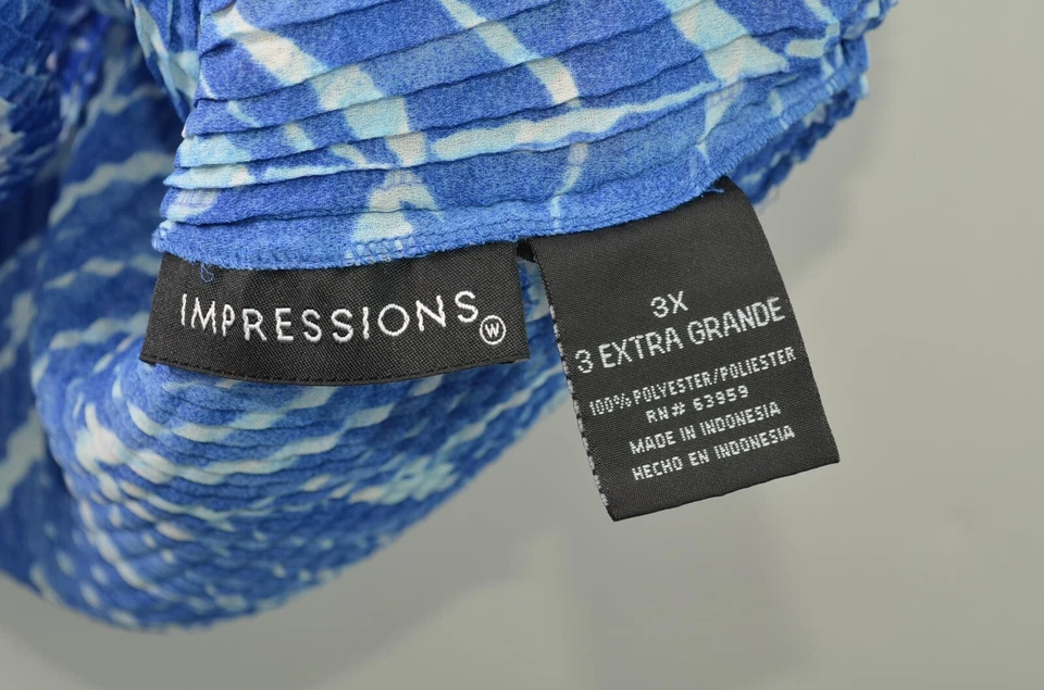 Blusa sin mangas Impressions para mujer 3X poliéster azul elástico Foto 3 de 4