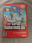 New ListingNintendo New Super Mario Bros. Wii Multiplayer Game No Manual