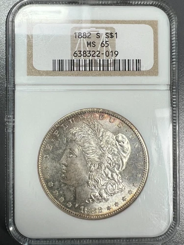  1882-S Morgan Silver Dollar NGC MS65 Frosty Blast White Light Peripheral Toning