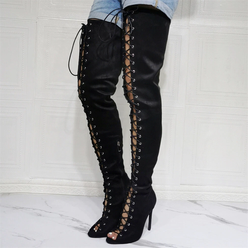 Long black top boots with heels
