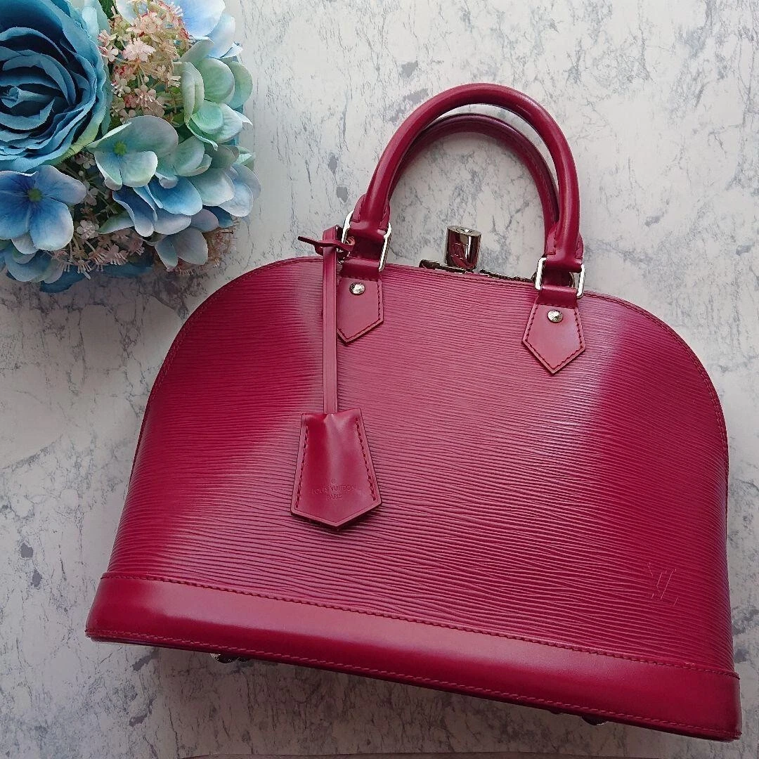 Sold Louis Vuitton Alma BB Epi Fuchsia