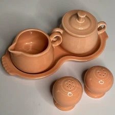 FIESTAWARE VINTAGE RETIRED APRICOT CREAM AND SUGAR TRAY SET AND SALT & PEPPER