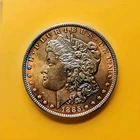 1885 O Morgan Silver Dollar 67 Toned with Gem Brilliant lustre.