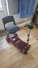 Luggie Fold Up Mobility Scooter 4 Wheels Adjustable Height Foldable Red Used.