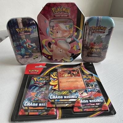 Pokémon Konvolut, Clefable Tin, 2x Luminose City Tins, Chaos Rising 3x Booster