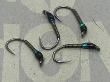 4ea. Jack Daniels Buzzers Size #10. Excellent still water pattern.