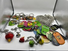 Lot Of Over 30 Angry Birds Dog Tags  Key Chains, 2 Necklaces  A Bracelet.